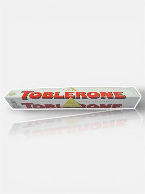 Toblerone White Chocolate With Honey & Almond Nogat 100 gm